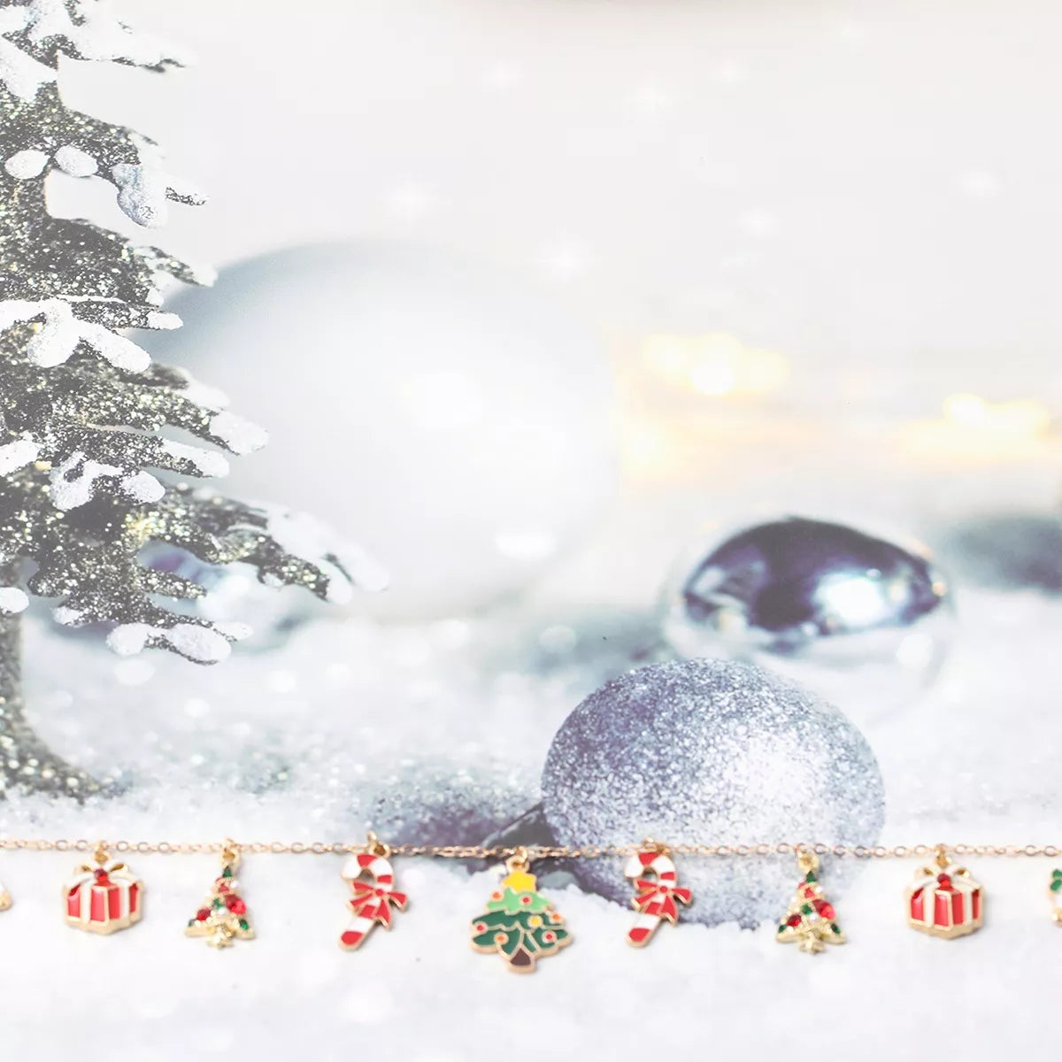 Gold-tone necklace with colorful Christmas charms — detail view