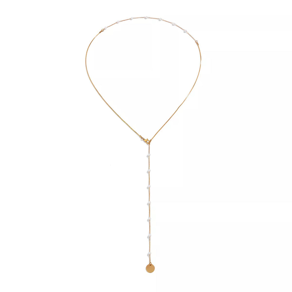 Gold-tone pearl-like station necklace with coin pendant