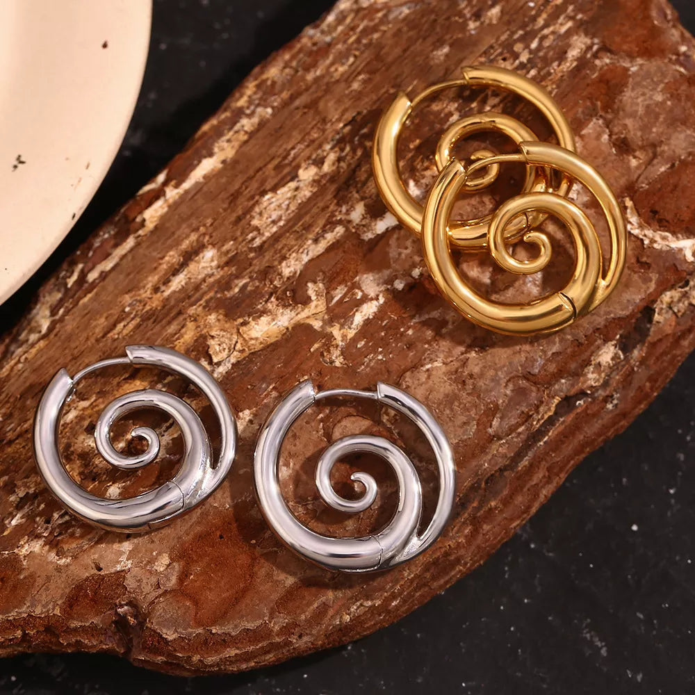 Spiral hoop earrings in gold-tone and silver-tone finishes — detail view