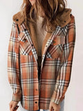 Orange plaid hooded jacket with brown plush lining, modeled from the front.