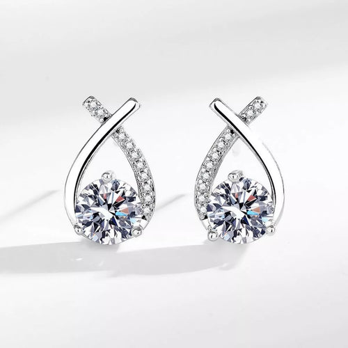 Silver-tone open teardrop earrings with round clear stones — detail view