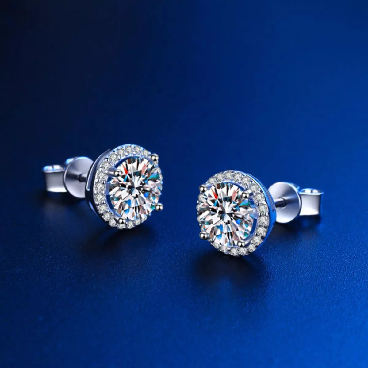 Silver-tone round halo stone stud earrings — detail view