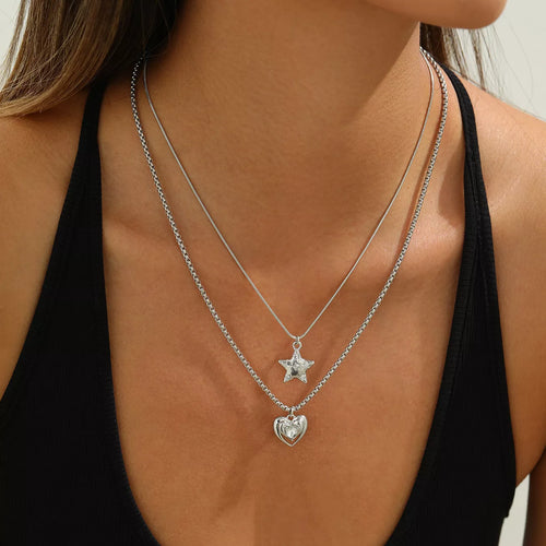 Layered silver-tone star and heart pendant necklaces