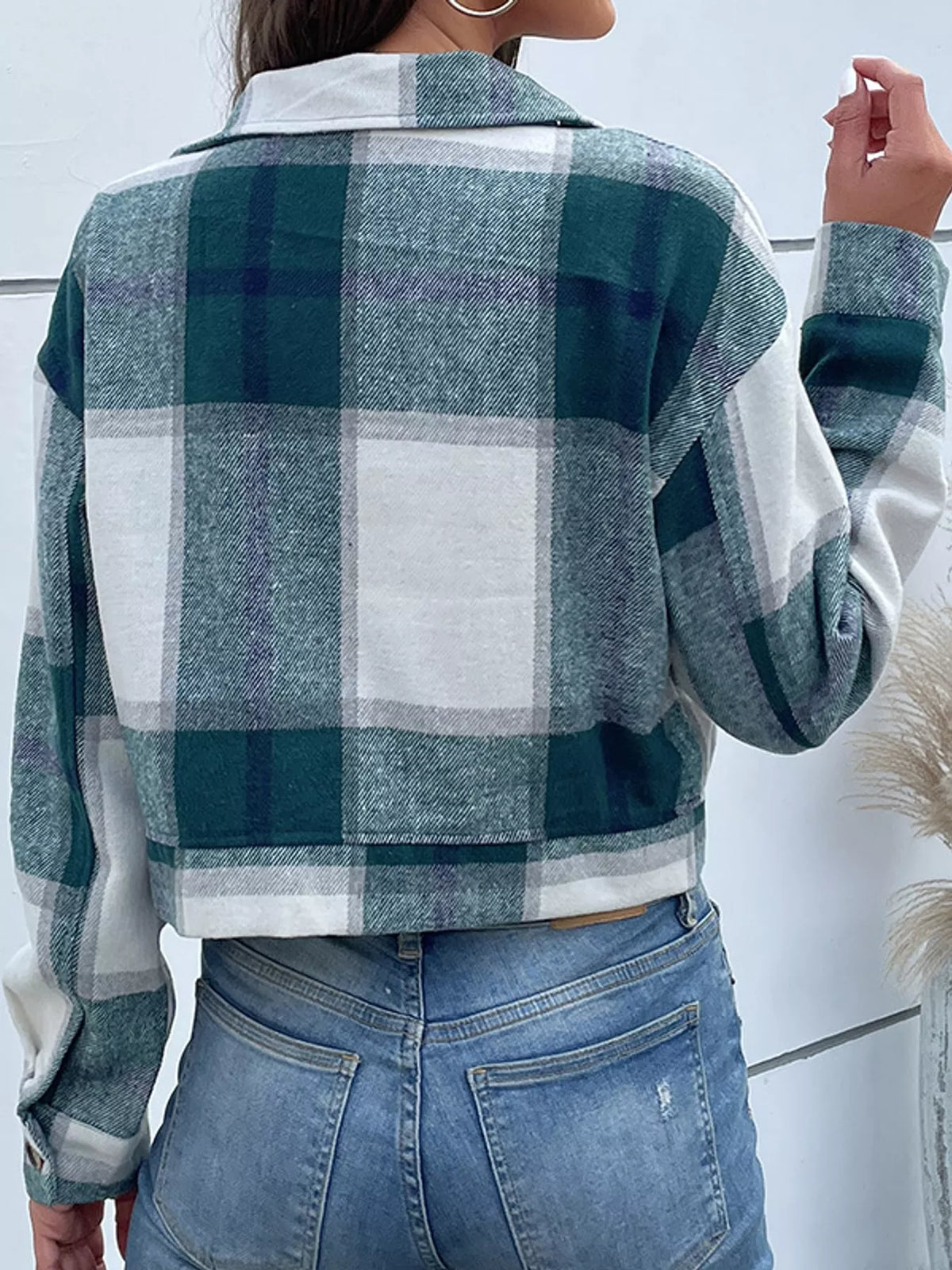 Green color-block plaid cropped jacket with flap chest pockets, back view.