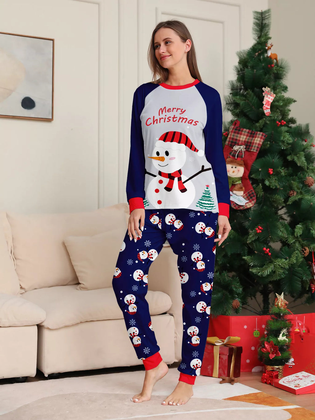 Front view of the women's navy-and-white snowman Christmas pajamas.