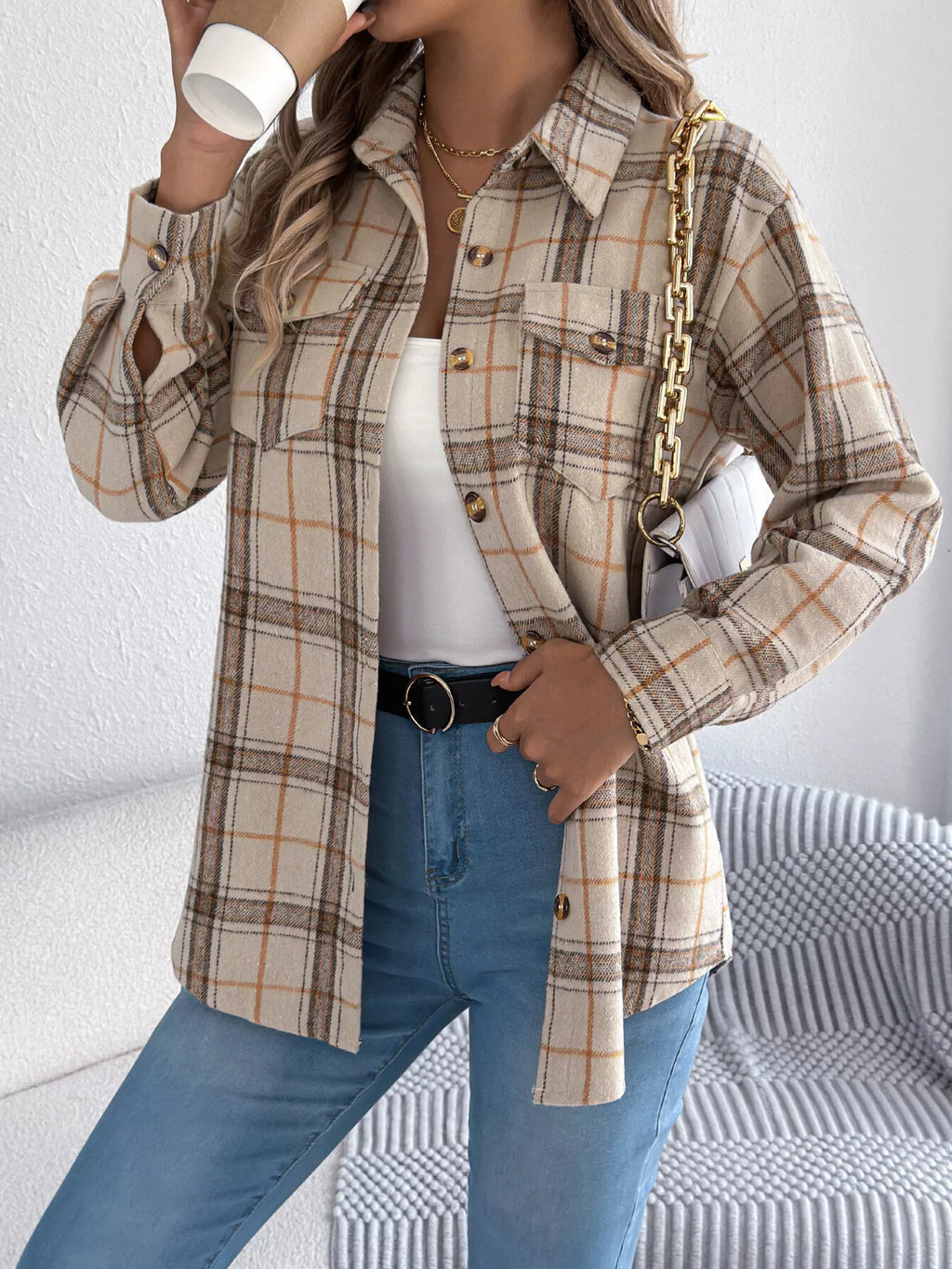 Apricot plaid button-down shacket with chest pockets, front view.