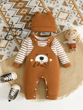 Children’s brown bear-print overalls with striped sleeves and matching hat displayed flat