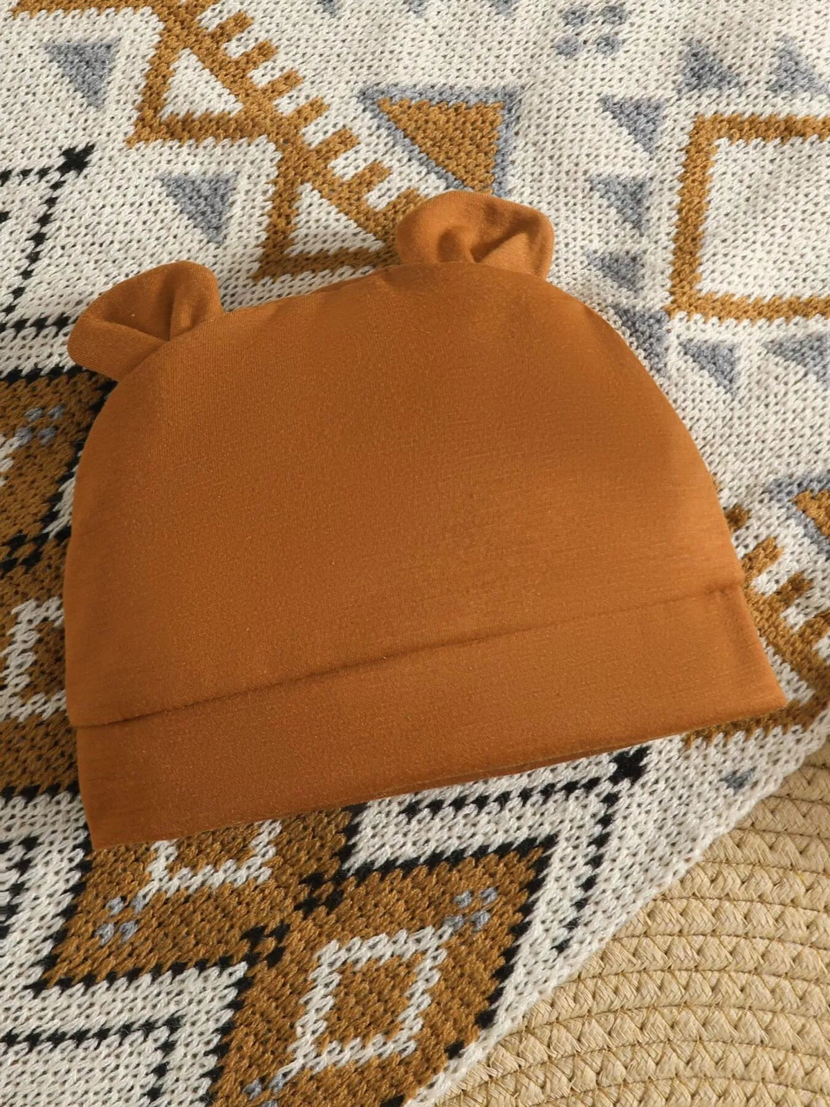 Brown baby hat with small rounded ears