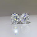 Silver-tone round clear stone stud earrings — detail view