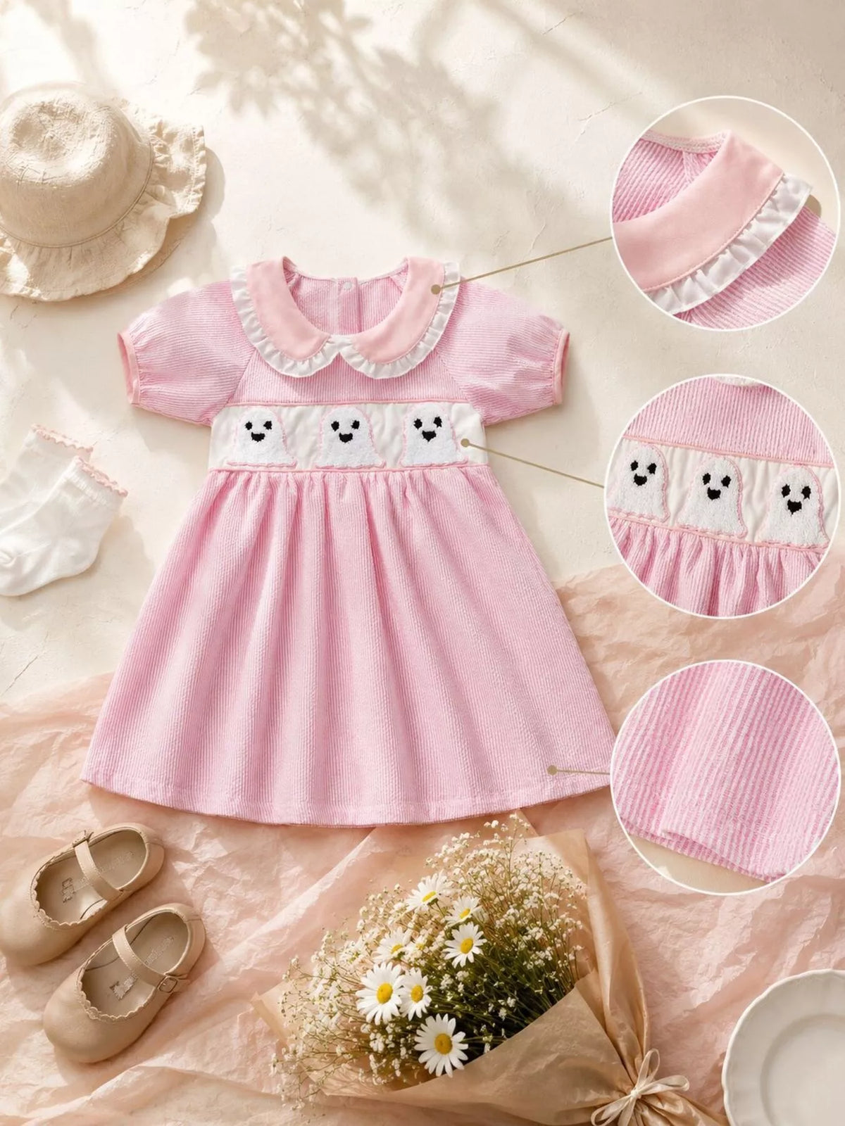 Pink ghost-print dress flat lay with inset views of the collar, waistband and fabric.