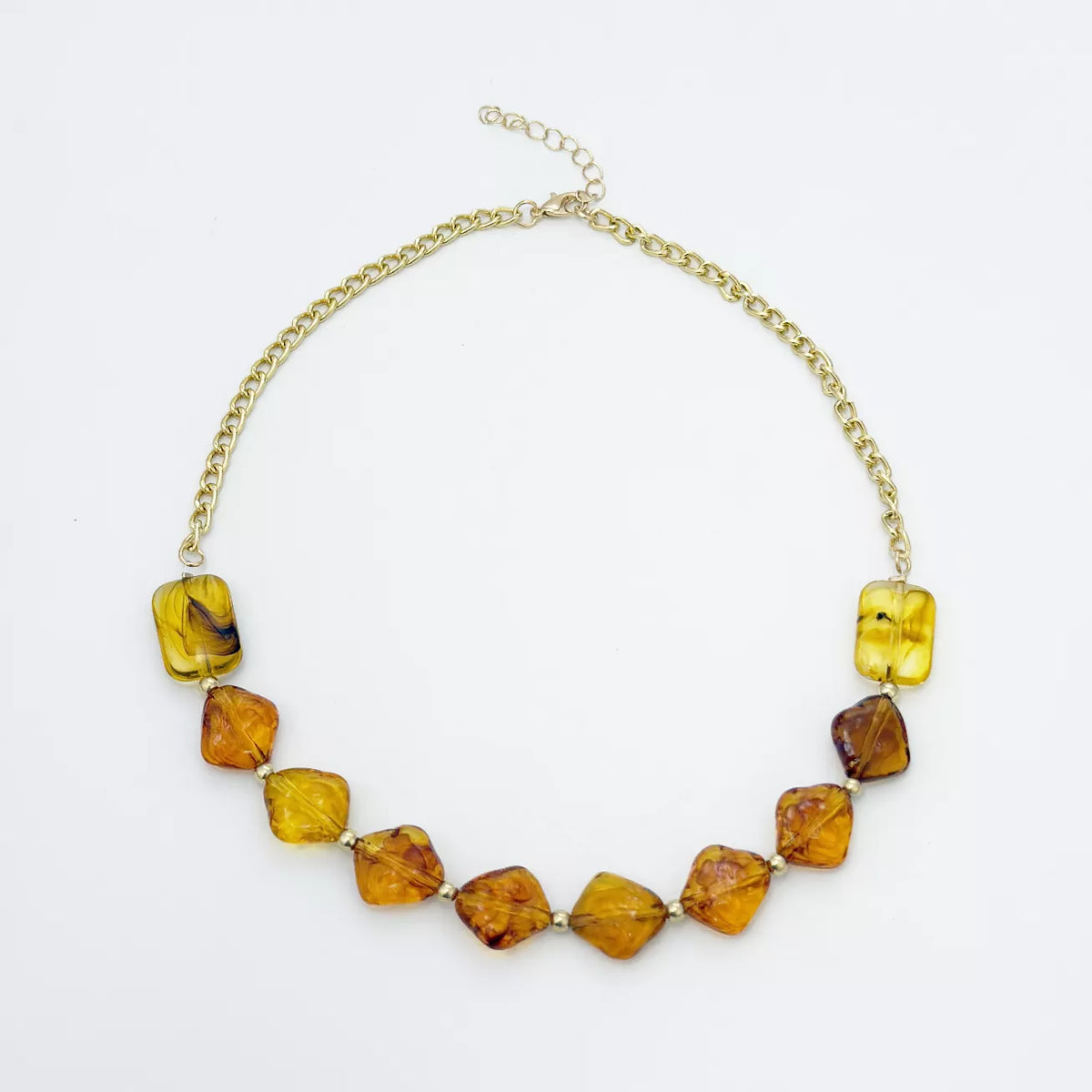 Gold-tone necklace with angular amber-colored beads