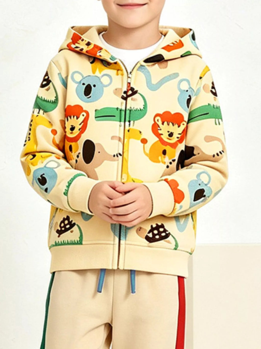 Close view of the cream hoodie's colorful animal print and front zipper.