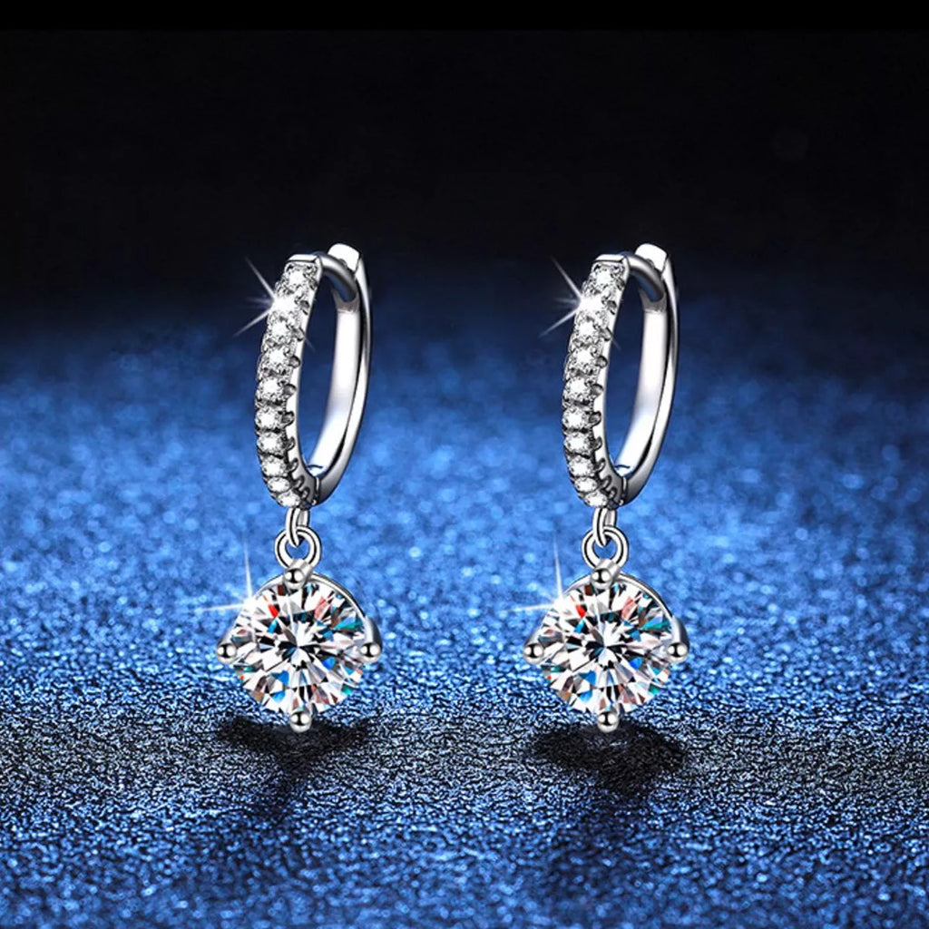 Silver-tone hoop earrings with round halo stone drops — detail view