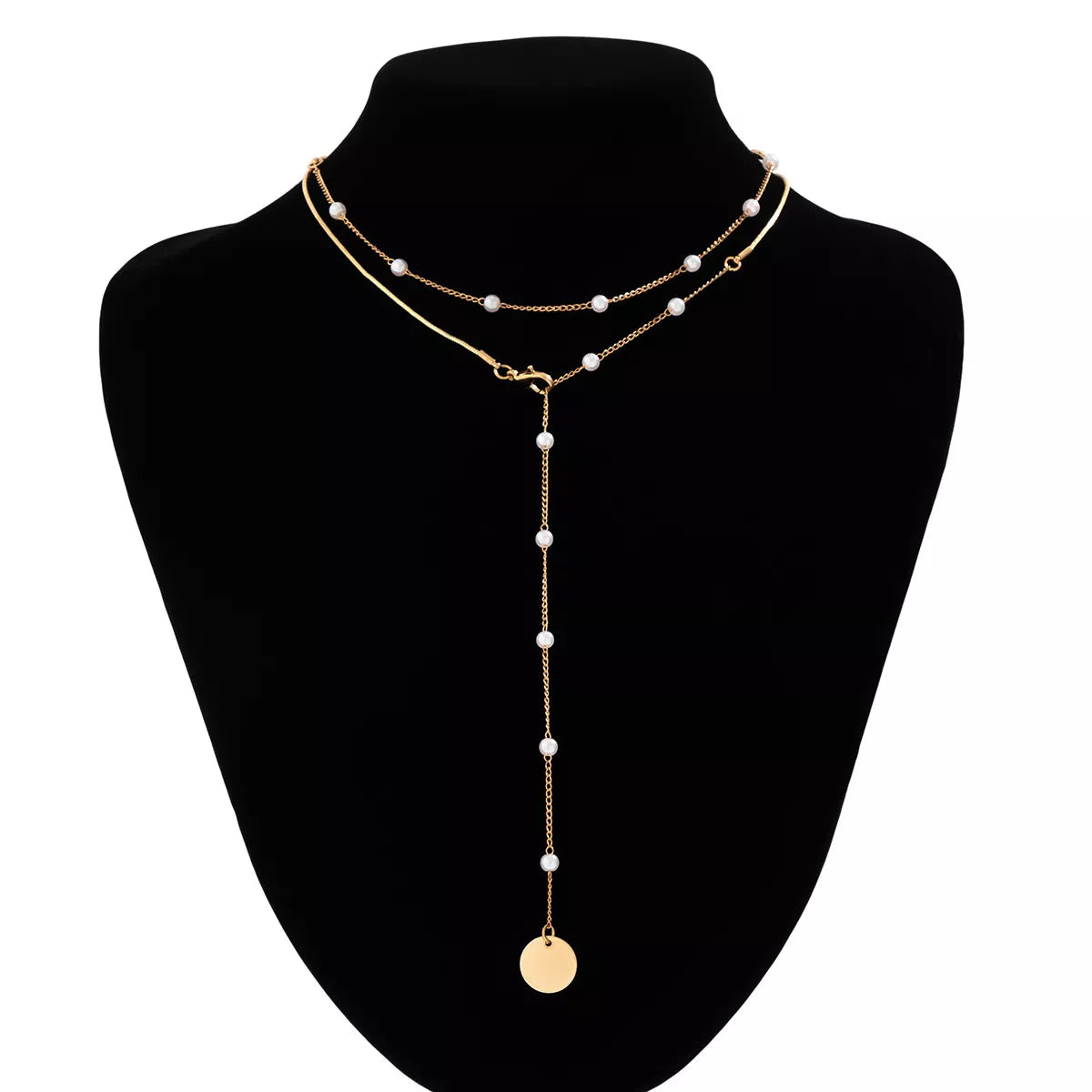 Gold-tone pearl-like station necklace with coin pendant