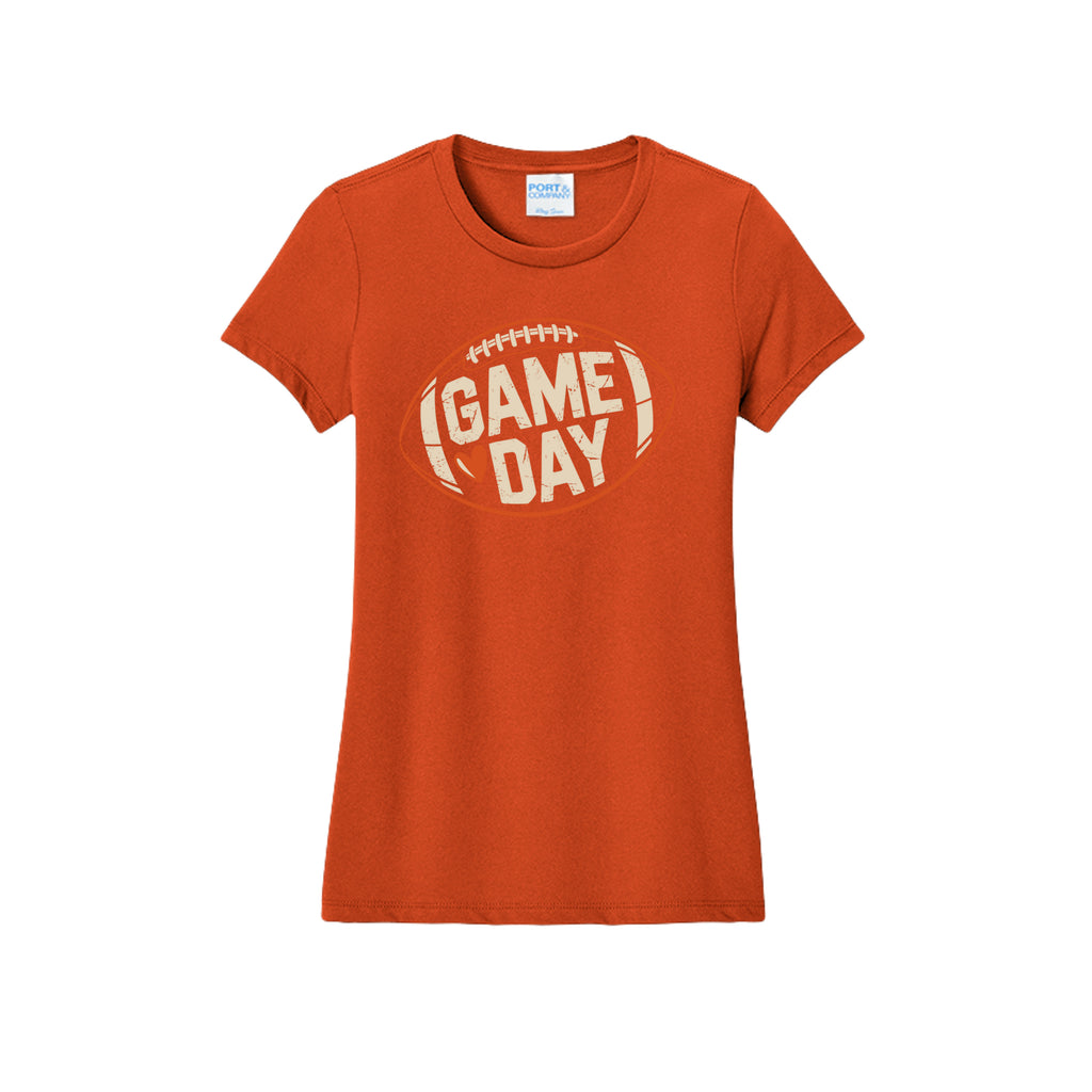 Front view of a orange fitted short-sleeve T-shirt with cream Game Day lettering and a heart inside an orange football outline.
