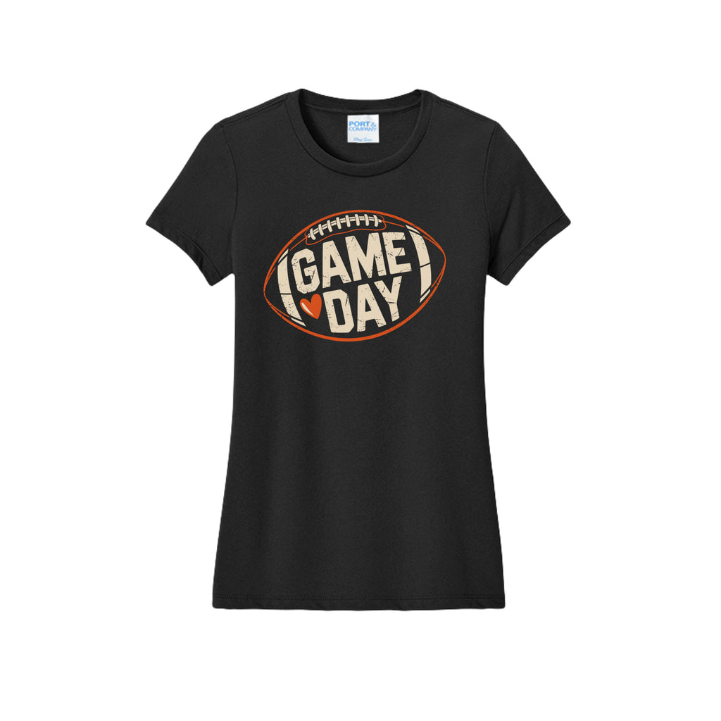 Front view of a black fitted short-sleeve T-shirt with cream Game Day lettering and a heart inside an orange football outline.