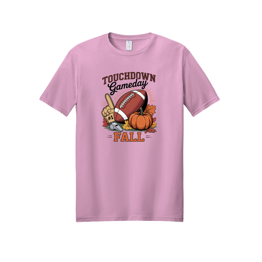 Front view of a light pink short-sleeve T-shirt with Touchdown Gameday Fall lettering with a football, pumpkin, foam finger, whistle, and autumn leaves.