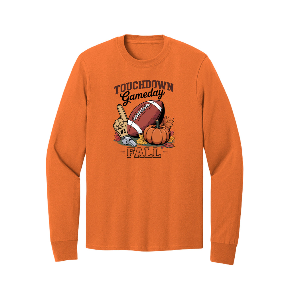 Front view of a orange long-sleeve T-shirt with Touchdown Gameday Fall lettering with a football, pumpkin, foam finger, whistle, and autumn leaves.