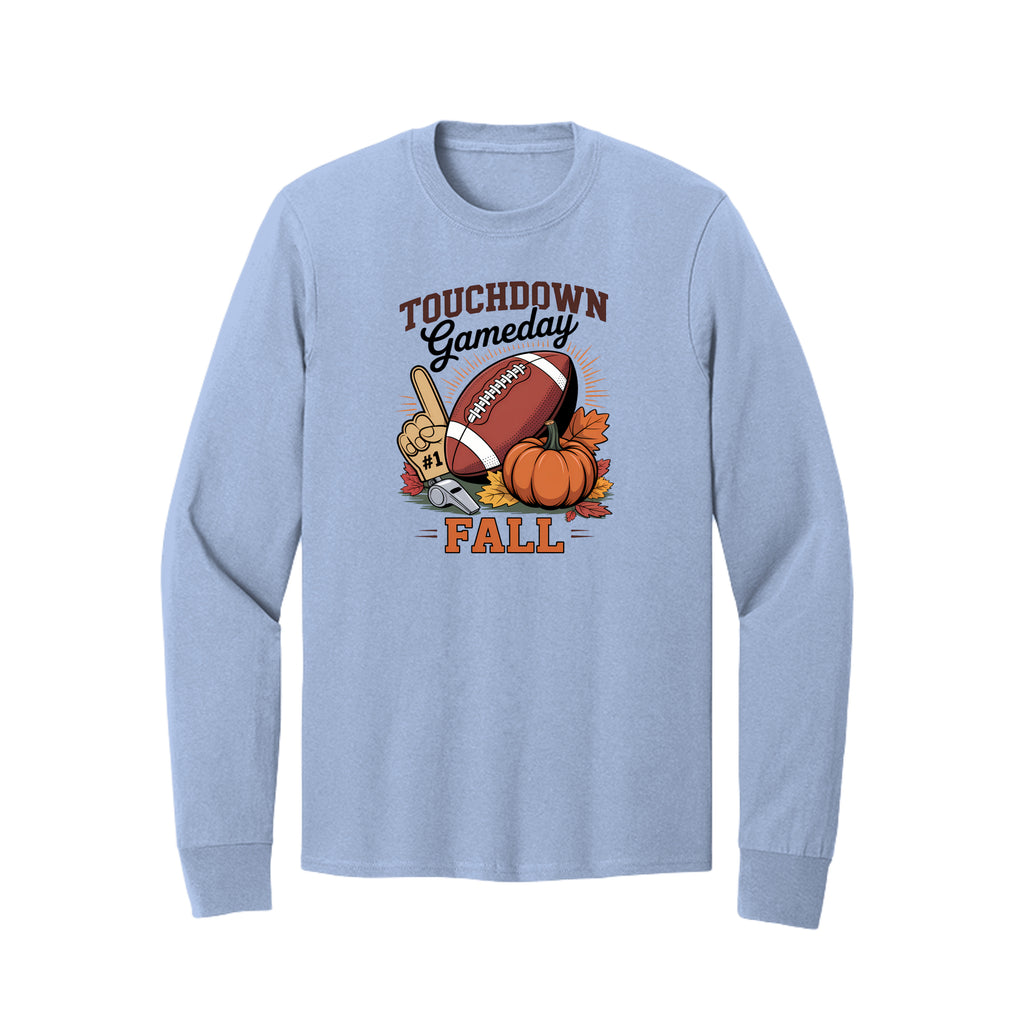 Front view of a light blue long-sleeve T-shirt with Touchdown Gameday Fall lettering with a football, pumpkin, foam finger, whistle, and autumn leaves.