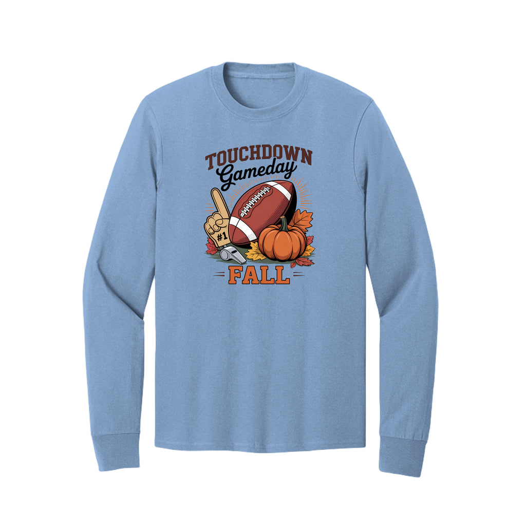 Front view of a light blue long-sleeve T-shirt with Touchdown Gameday Fall lettering with a football, pumpkin, foam finger, whistle, and autumn leaves.