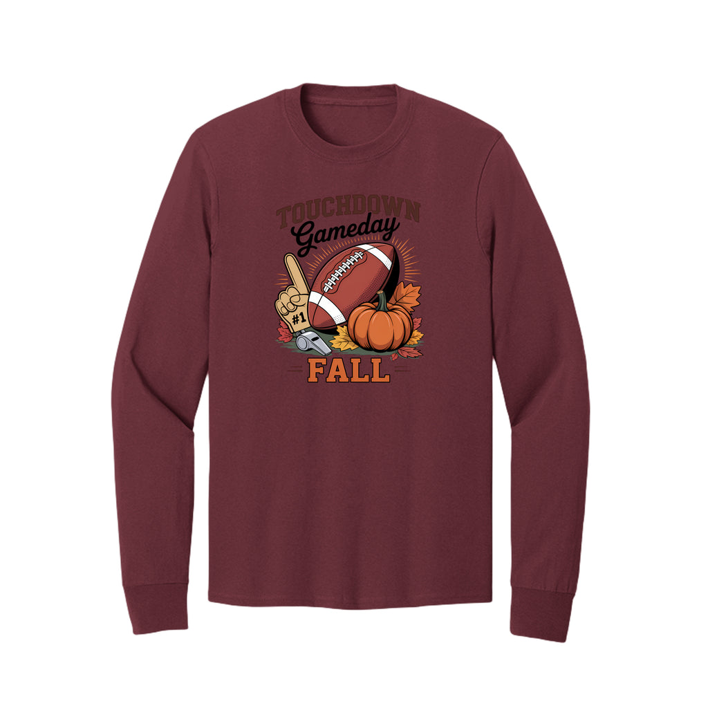 Front view of a burgundy long-sleeve T-shirt with Touchdown Gameday Fall lettering with a football, pumpkin, foam finger, whistle, and autumn leaves.