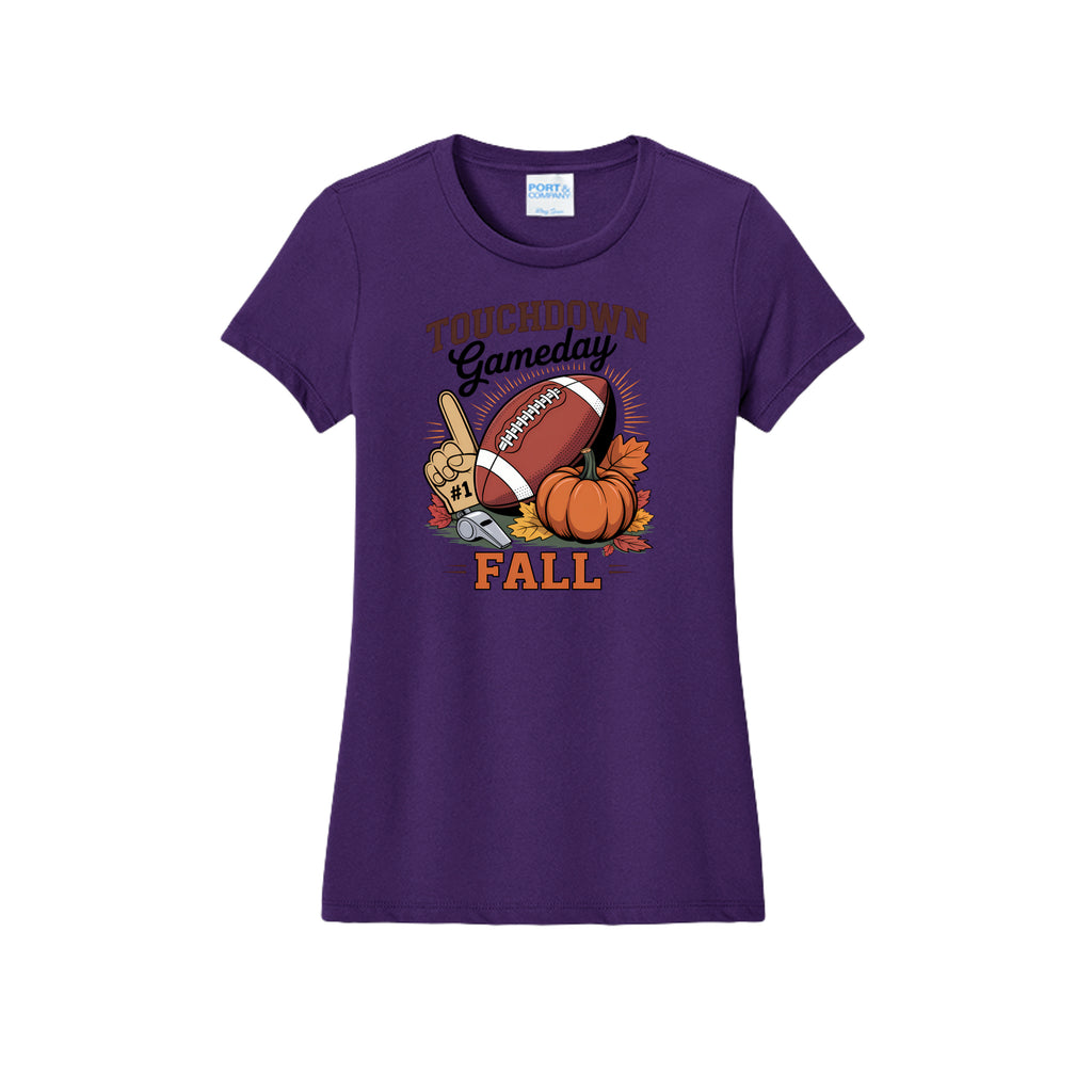 Front view of a purple fitted short-sleeve T-shirt with Touchdown Gameday Fall lettering with a football, pumpkin, foam finger, whistle, and autumn leaves.