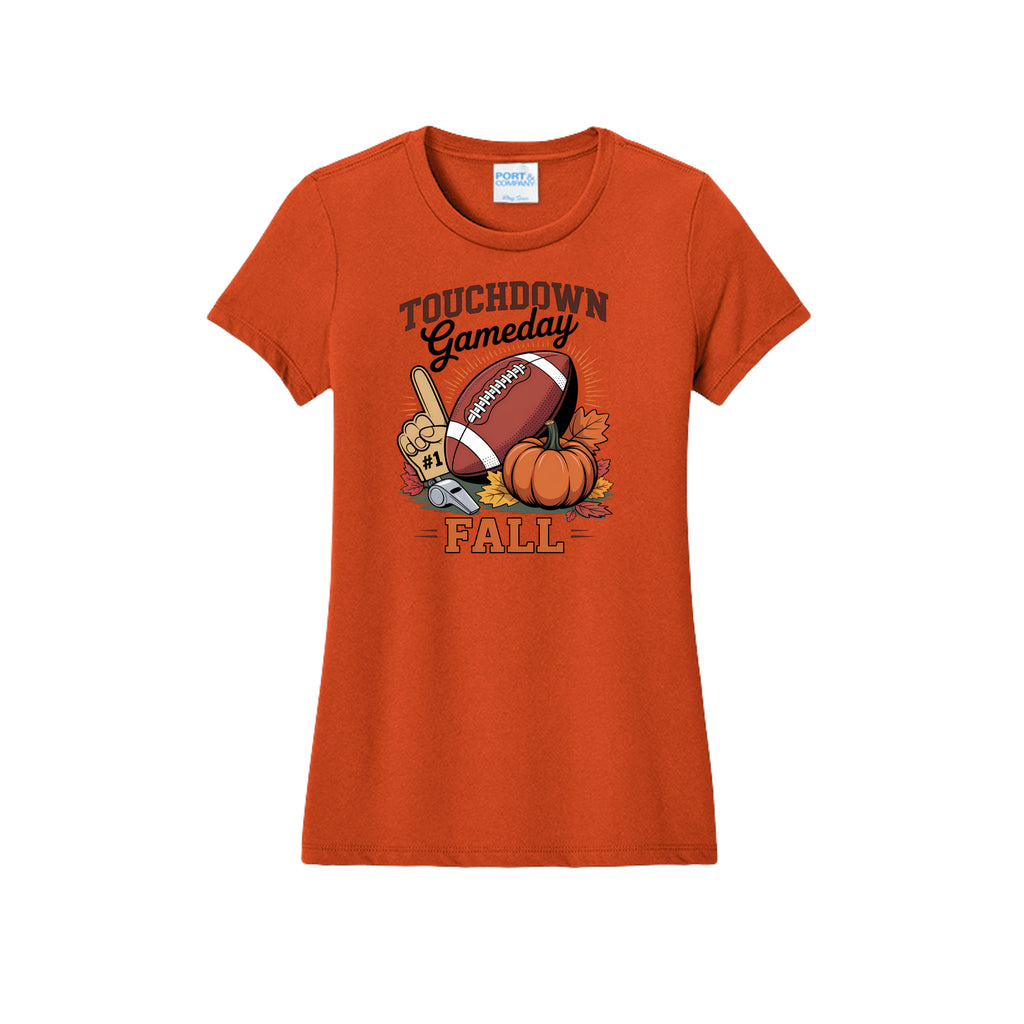 Front view of a orange fitted short-sleeve T-shirt with Touchdown Gameday Fall lettering with a football, pumpkin, foam finger, whistle, and autumn leaves.