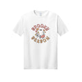 Front view of a white short-sleeve T-shirt showing Spooky Season lettering around a white ghost surrounded by pink, orange, and yellow flowers.