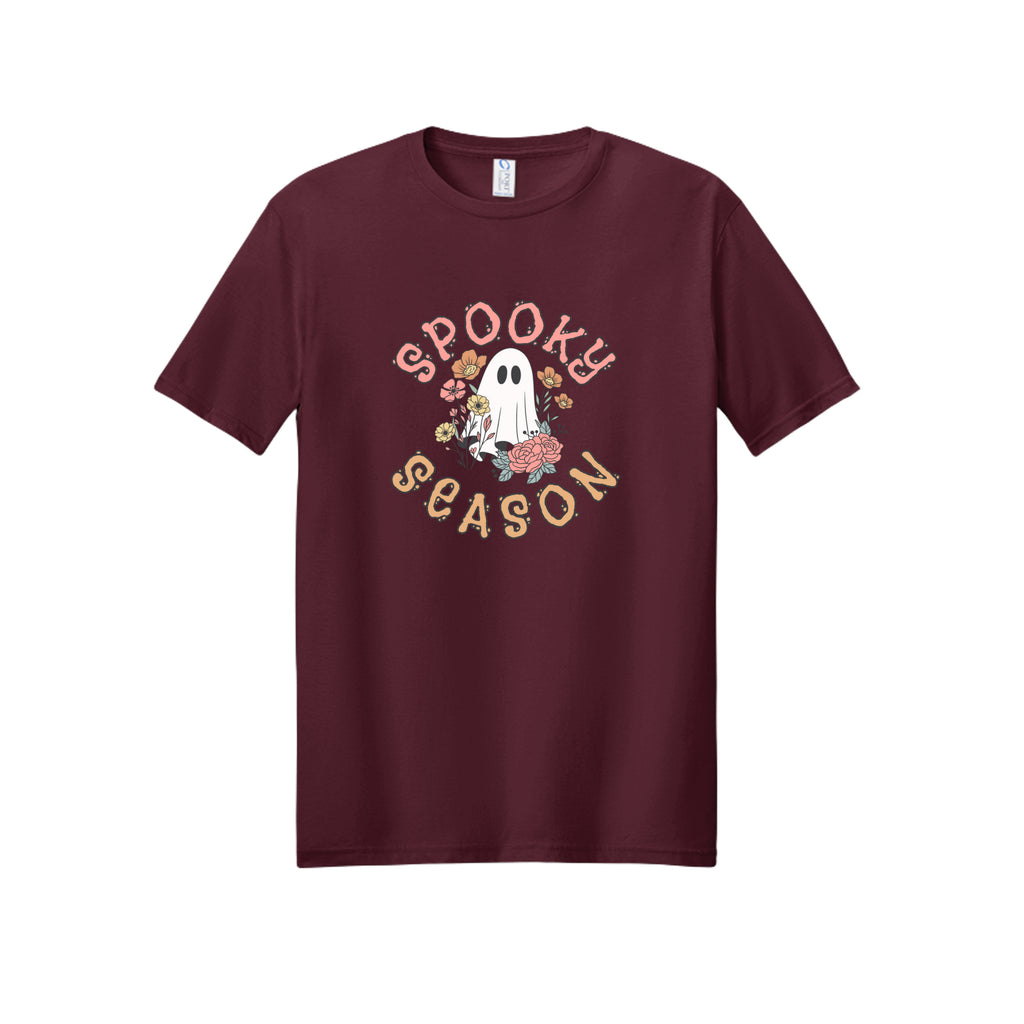 Front view of a burgundy short-sleeve T-shirt showing Spooky Season lettering around a white ghost surrounded by pink, orange, and yellow flowers.