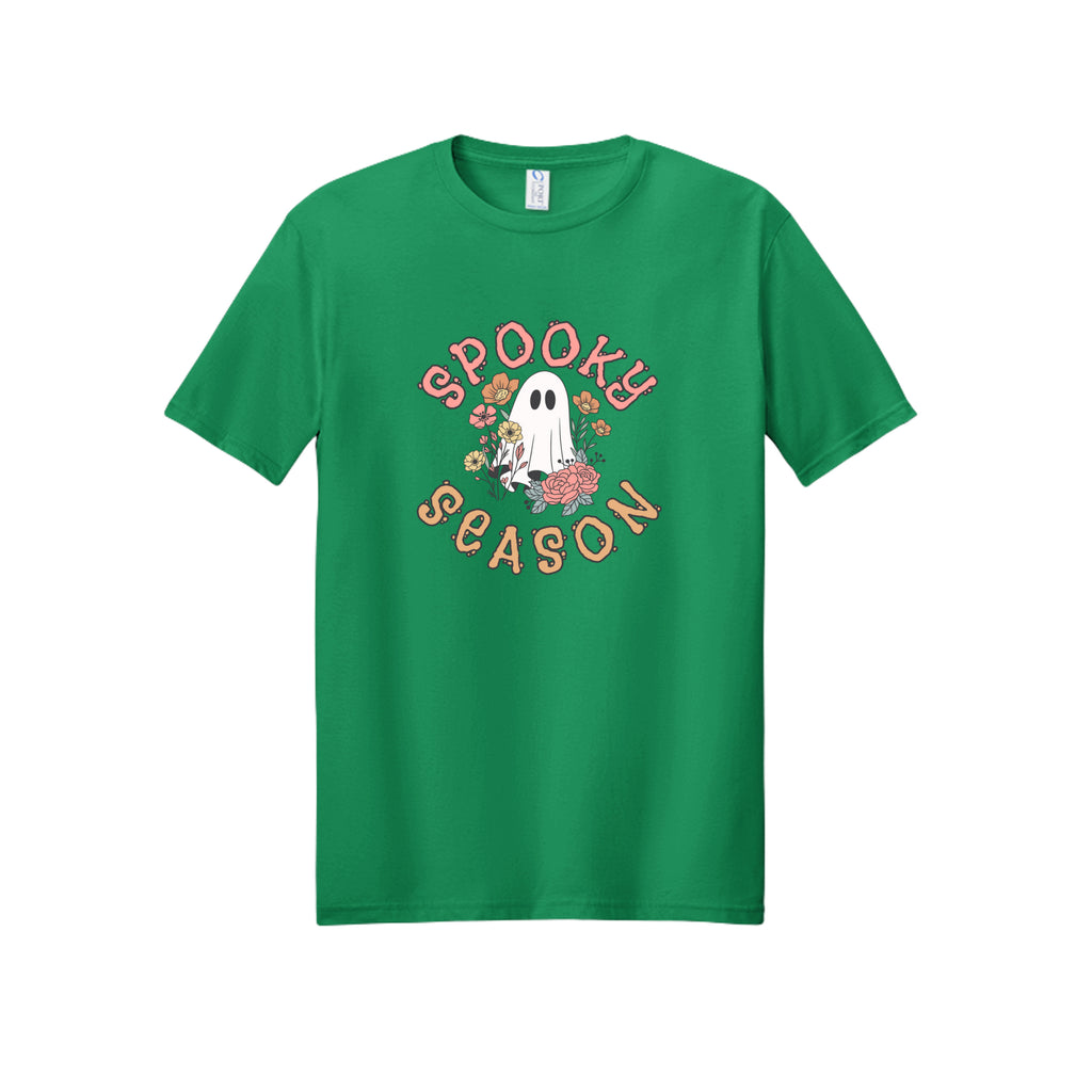 Front view of a green short-sleeve T-shirt showing Spooky Season lettering around a white ghost surrounded by pink, orange, and yellow flowers.