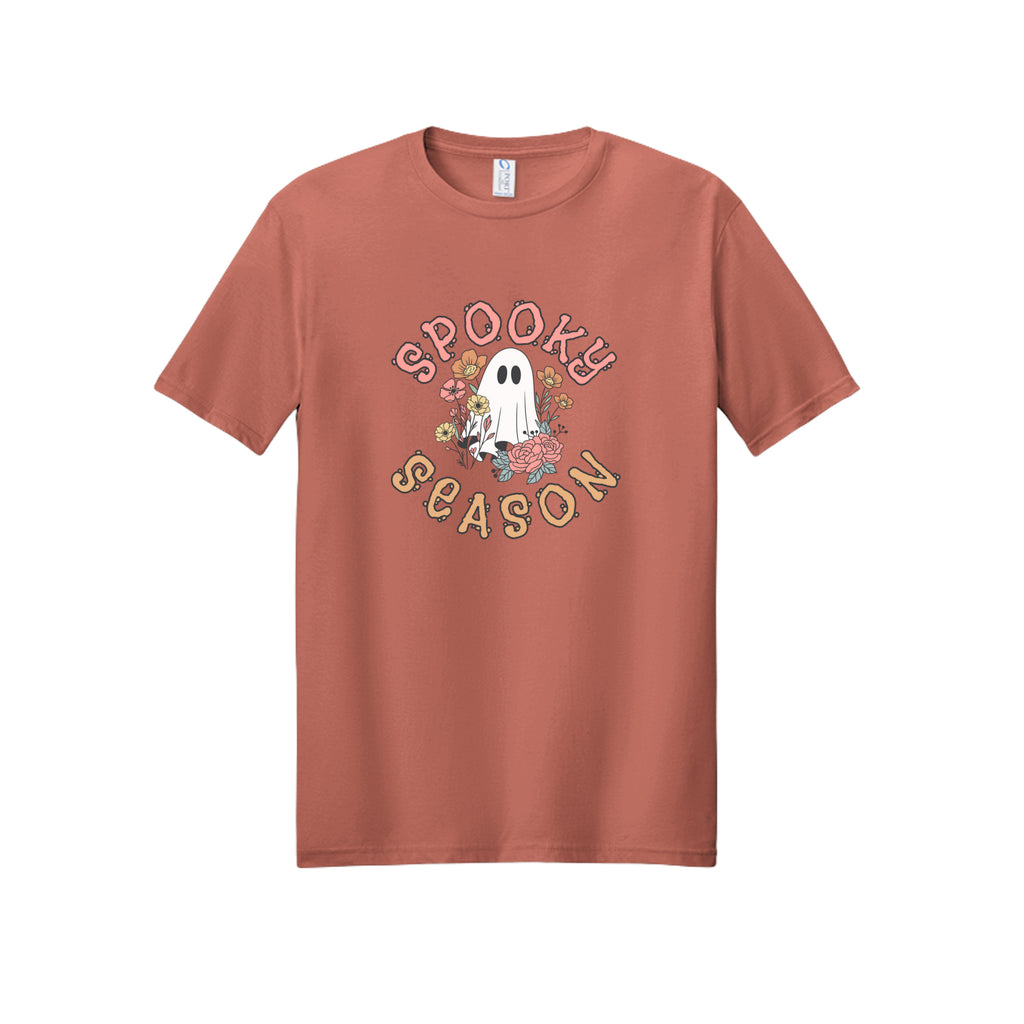 Front view of a dusty rose short-sleeve T-shirt showing Spooky Season lettering around a white ghost surrounded by pink, orange, and yellow flowers.