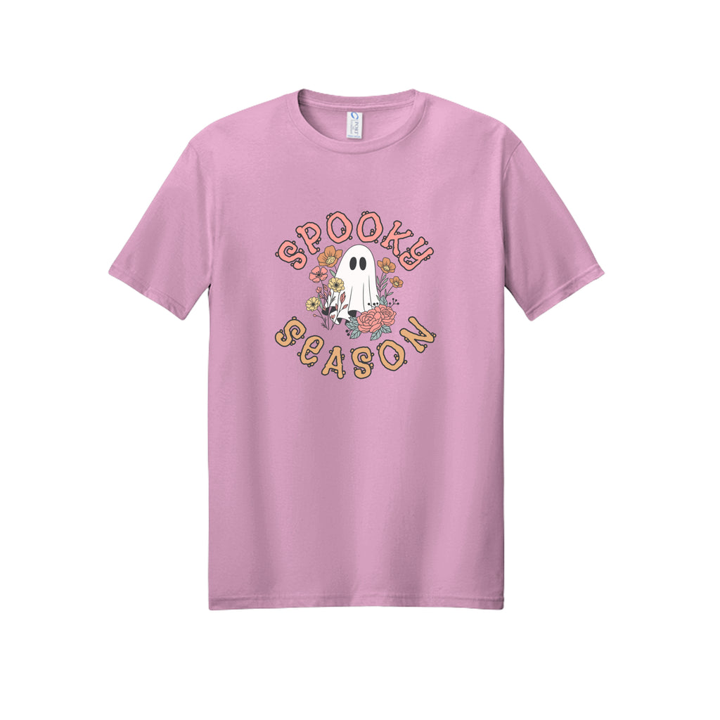 Front view of a light pink short-sleeve T-shirt showing Spooky Season lettering around a white ghost surrounded by pink, orange, and yellow flowers.