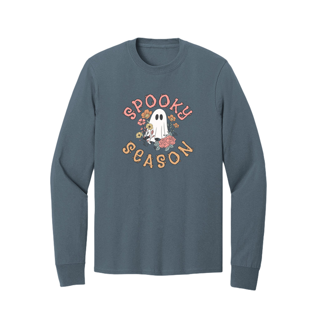 Front view of a blue long-sleeve T-shirt showing Spooky Season lettering around a white ghost surrounded by pink, orange, and yellow flowers.