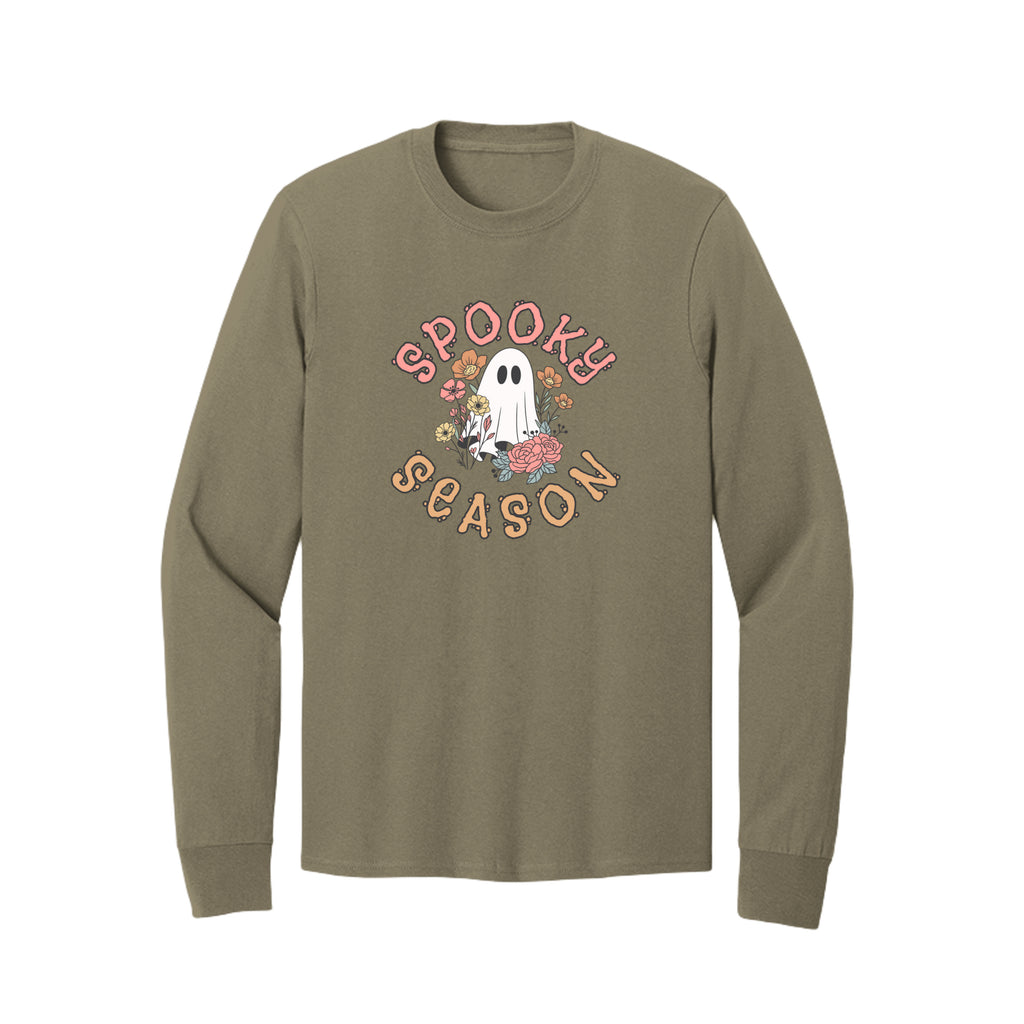 Front view of a olive long-sleeve T-shirt showing Spooky Season lettering around a white ghost surrounded by pink, orange, and yellow flowers.