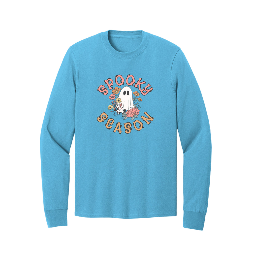 Front view of a blue long-sleeve T-shirt showing Spooky Season lettering around a white ghost surrounded by pink, orange, and yellow flowers.