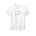 Front view of a white short-sleeve T-shirt showing three cream ghosts wearing pink skull-accented bows above Happy Halloween script.