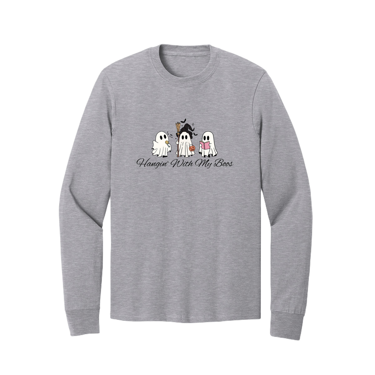 Front view of a gray long-sleeve T-shirt showing three ghosts with a microphone, witch hat and broom, pumpkin bucket, and pink book.